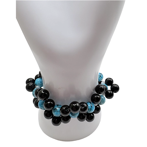Bracelet artisanal en perles noires brillantes et perles bleues effet pierre